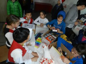 Kids playing with AGS toys and gifts in Romania